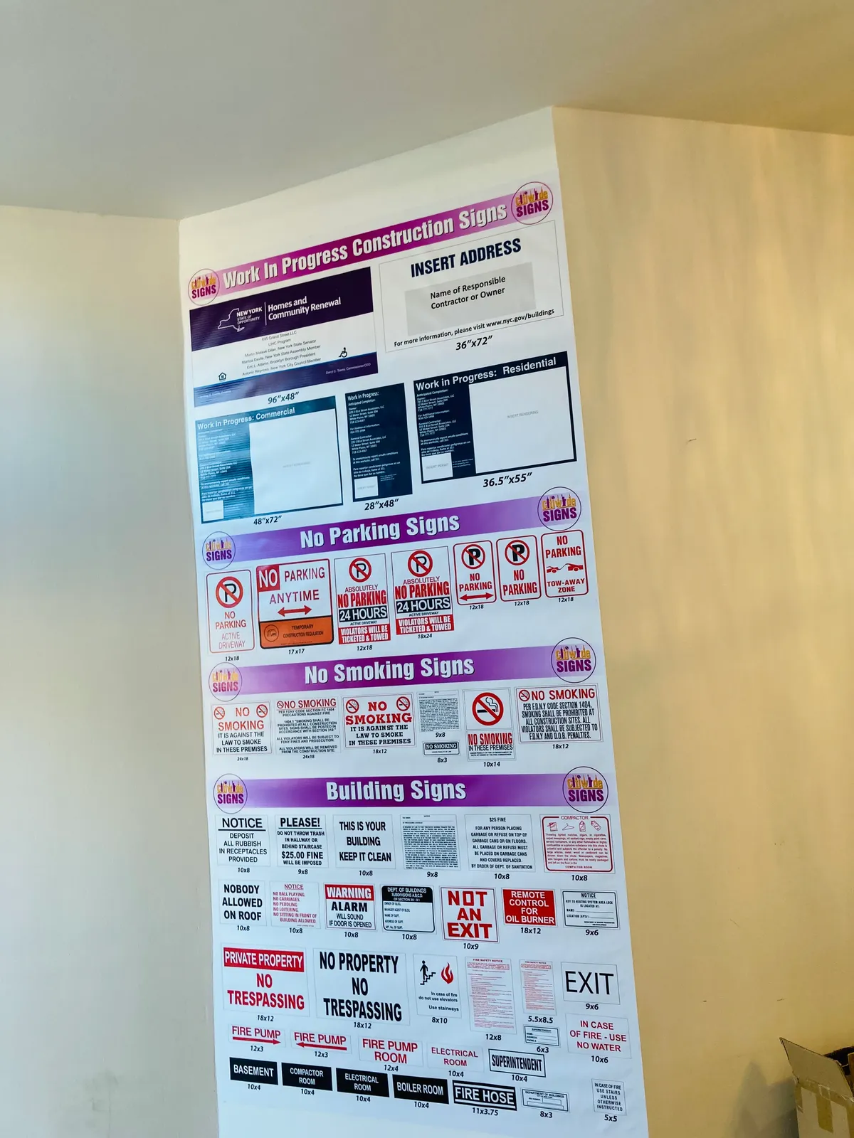 Printed NYC compliance signs for parking, smoking and buildings