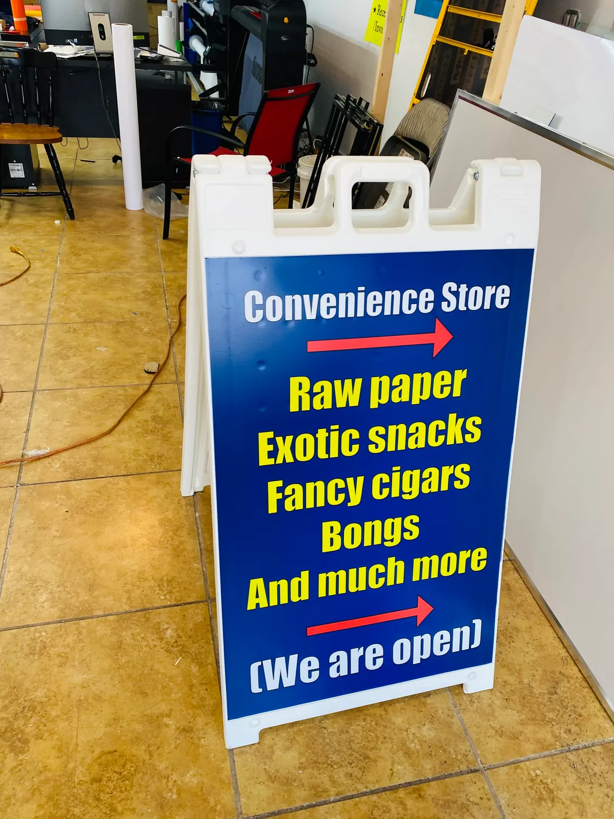 Convenience store A-frame sidewalk sign for New York shop