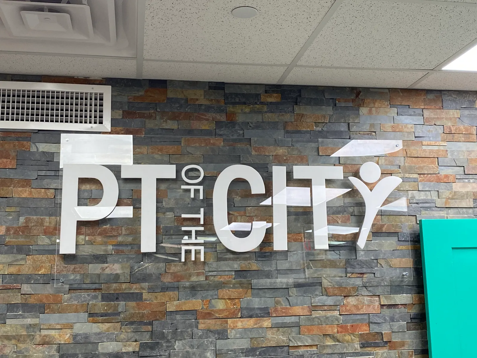 PT of the City dimensional wall letters for New York clinic