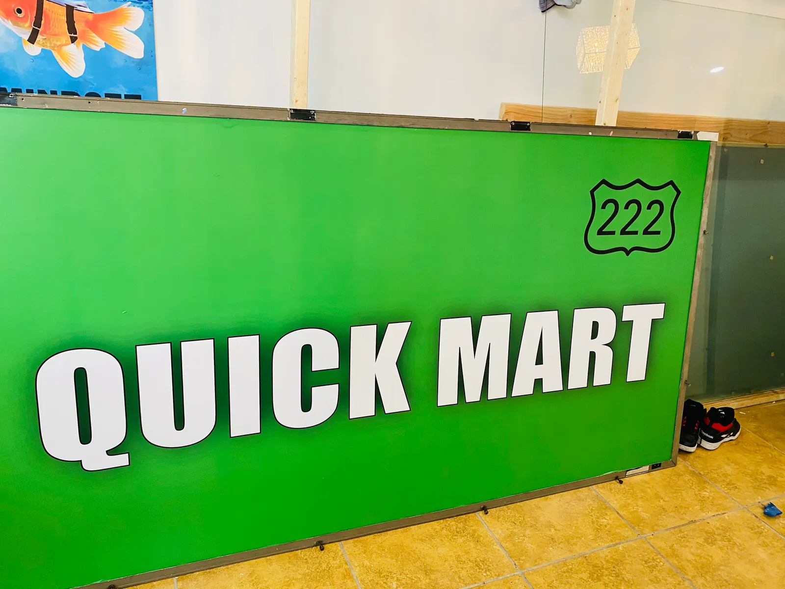 Quick Mart storefront panel sign built for New York store