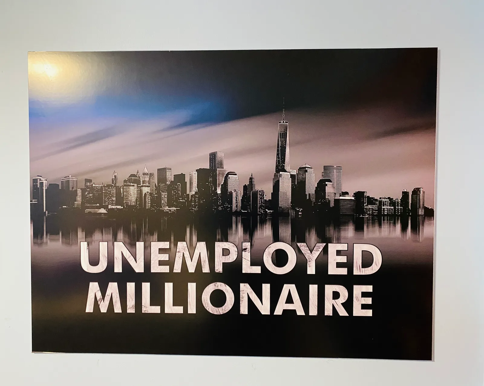 Unemployed Millionaire printed panel with New York skyline