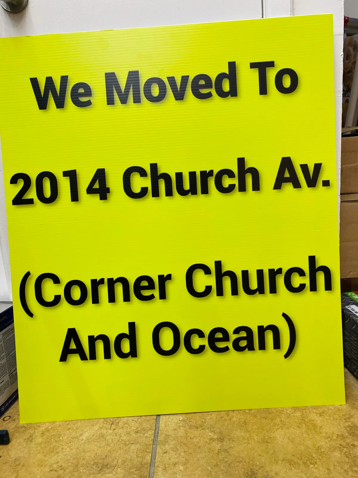 Yellow directional address panel sign for Church Ave Brooklyn