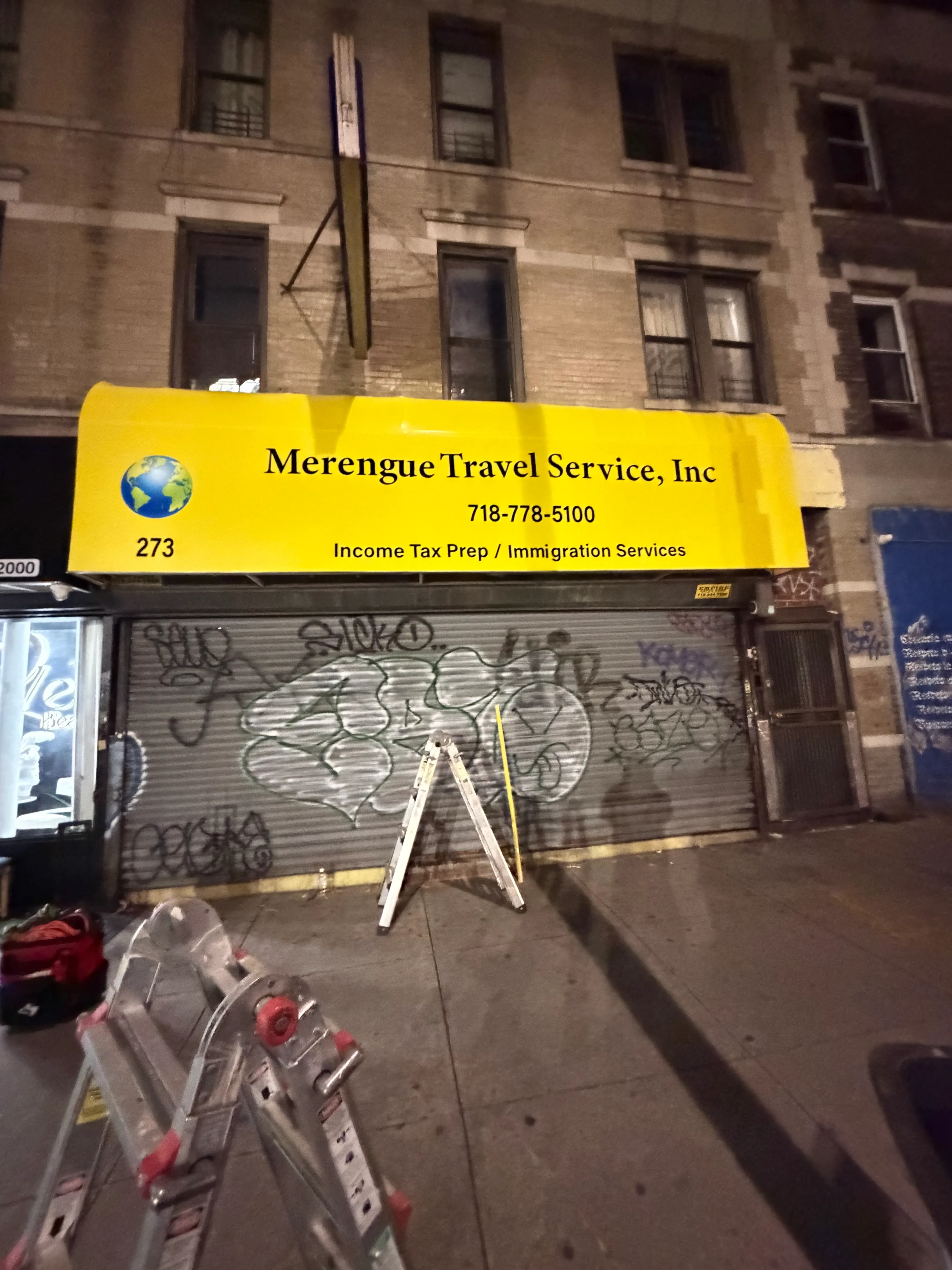 Lit storefront sign installed in NYC
