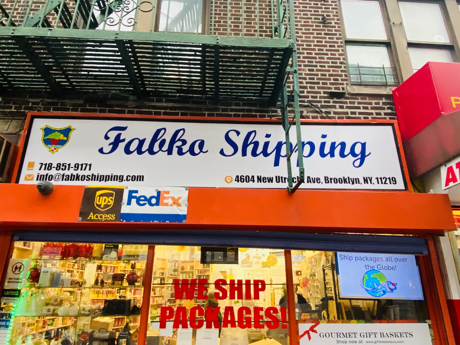 Fabko Shipping storefront sign and window graphics in Brooklyn