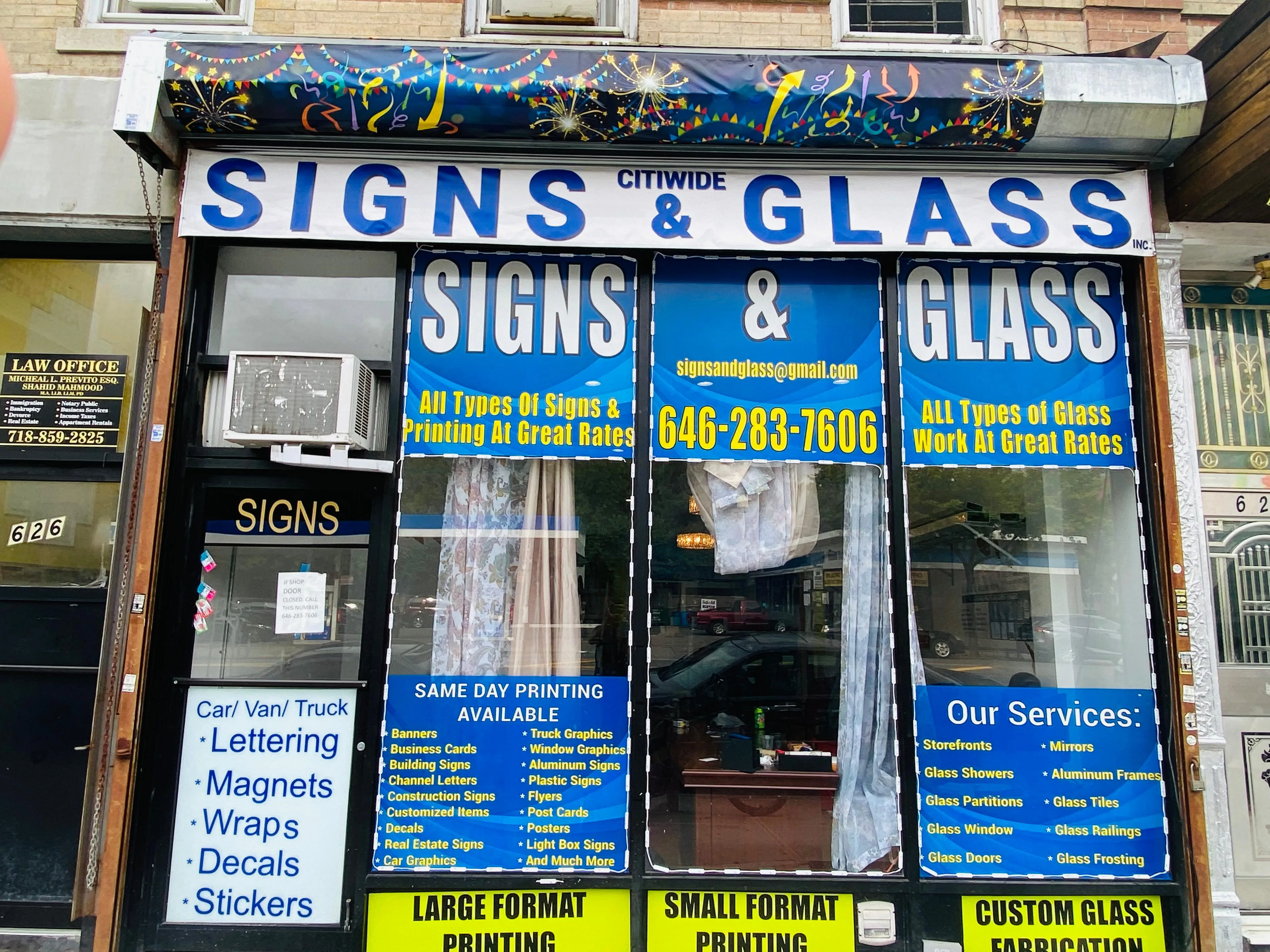 Storefront window graphic installation NYC