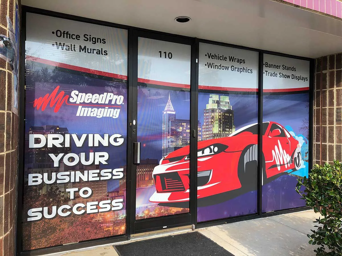 Perforated window vinyl storefront NYC