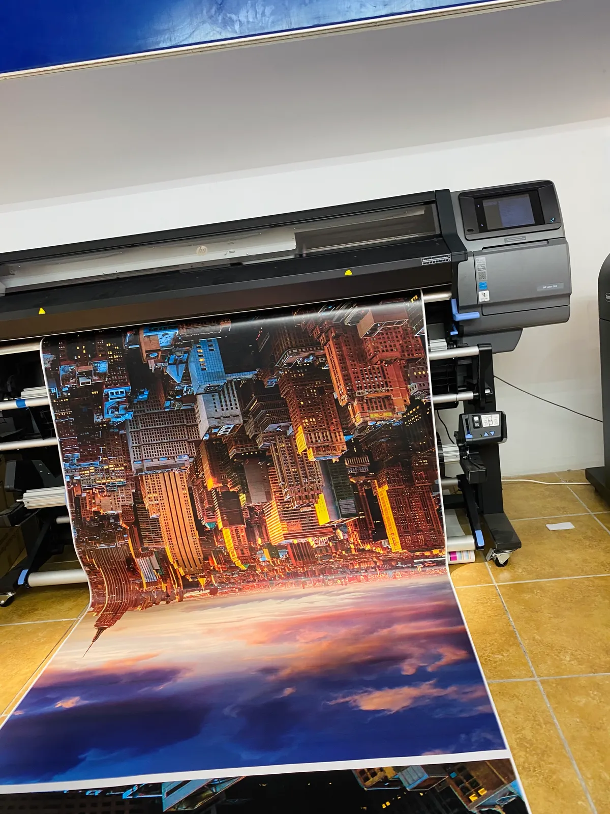 Large-format printer producing NYC skyline wall mural